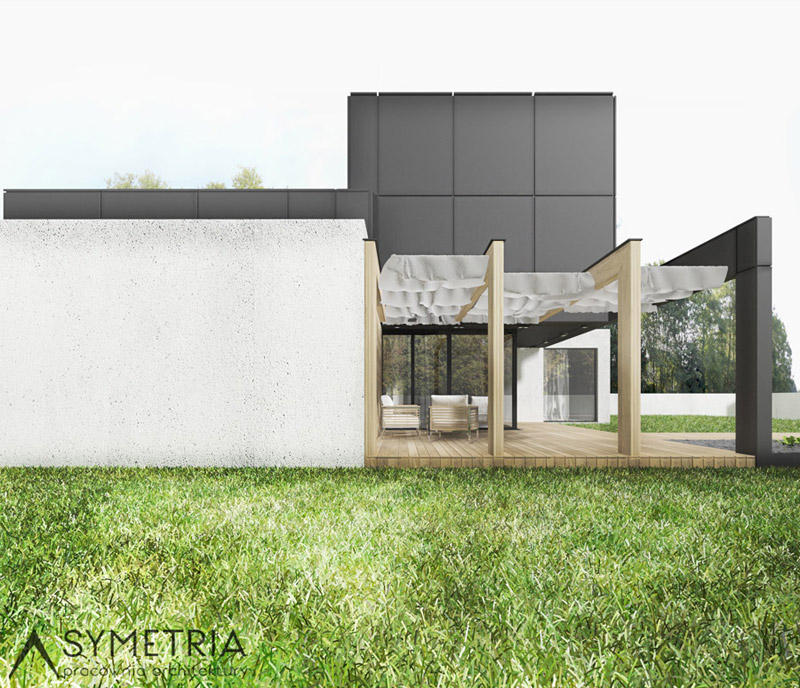 Dom z drewna, blachy i betonu. Projekt: Pracownia Architektury Symetria