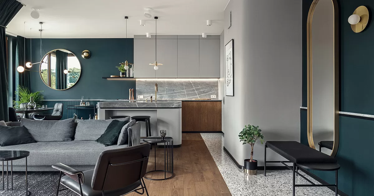 Naturalne materiały i geometryczne formy w stylowych wnętrzach apartamentu
