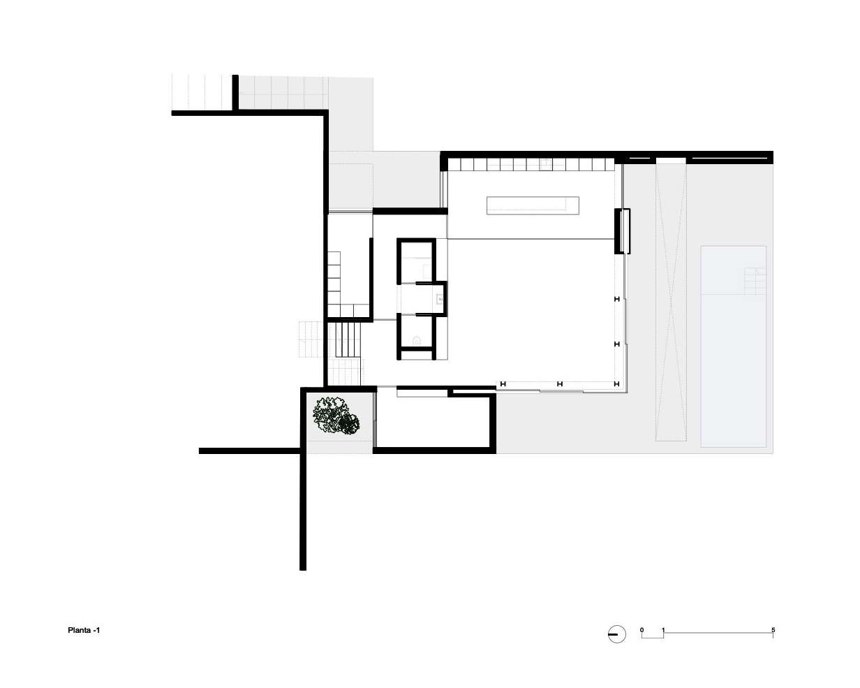 Betonowy dom z ciepłym i pomysłowym wnętrzem