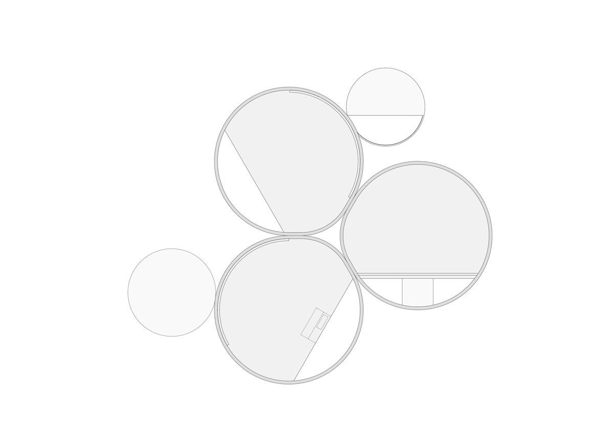 Nietypowa, cylindryczna forma domu w otoczeniu g&oacute;r