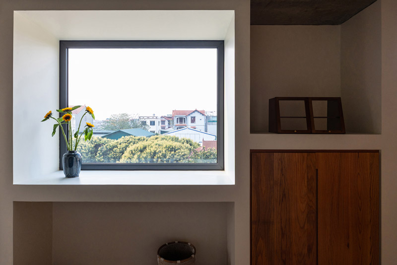 100 WINDOWS &ndash; wielopokoleniowy dom w Hanoi